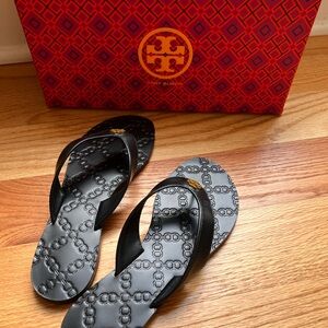 New! Tory Burch Black leather thong sandles. Never worn. Box included.